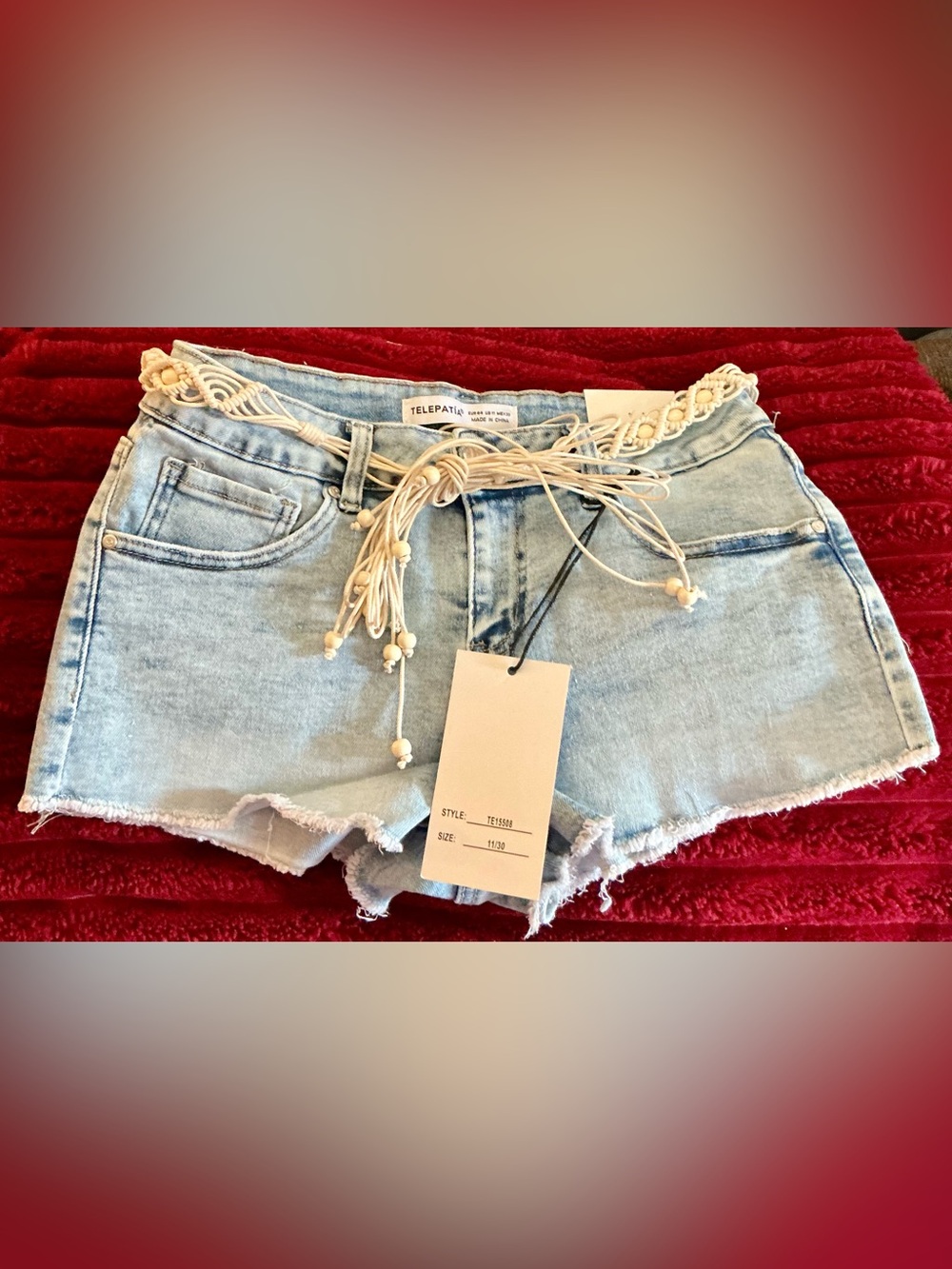 Telepath Light Wash Lace-Trim Denim Shorts with Tassel Belt